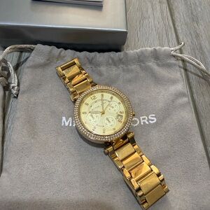 Michael Kors woman’s Gold Watch